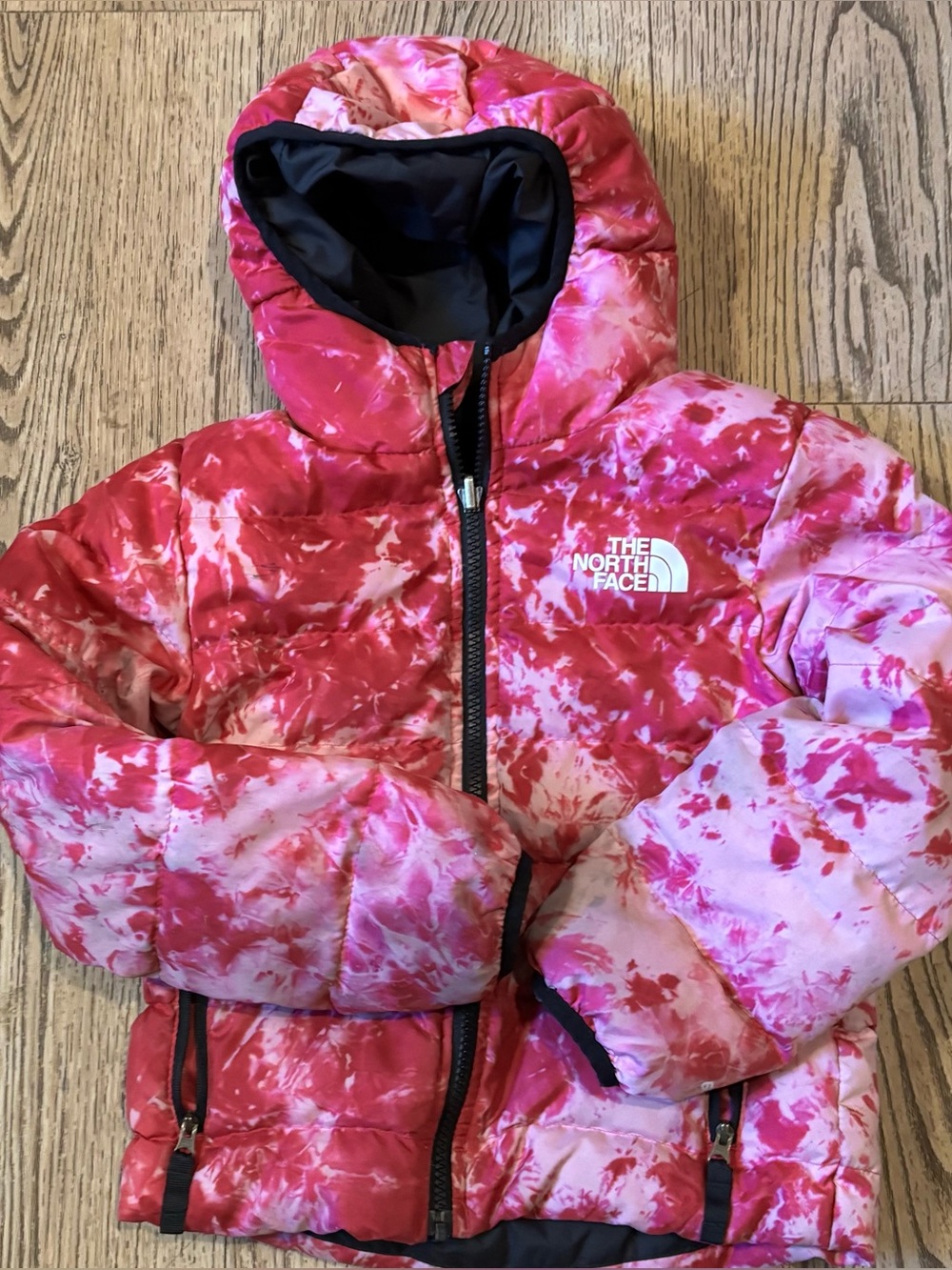 The North Face kids coat with hood.  Reversible